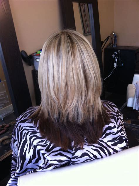 By sarabotsfordhair. 4. Shoulder-Length Dark Blonde Hair. Go for a dark blonde shade if you have short-to-medium hair. Lighter strands will emphasize the fullness where you need it most, ultimately adding volume and life to your hairdo. By Lucas Vaz. 5. Medium Dark Blonde Hair and Money Piece.