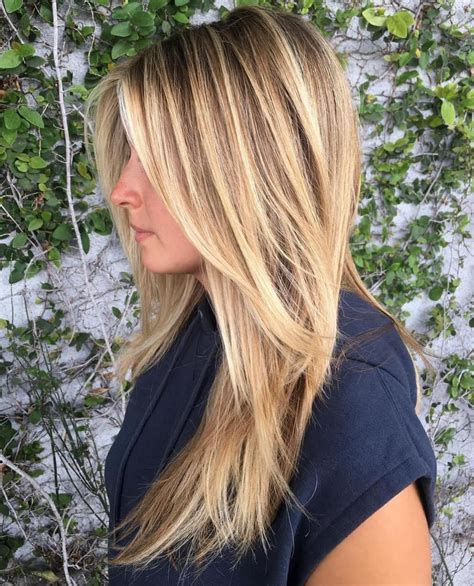 Ash blonde is a hair color that contains cool undertones such as blue, violet or purple. Different from brassy or golden blonde, it lacks yellow or red undertones. The blue or silv...
