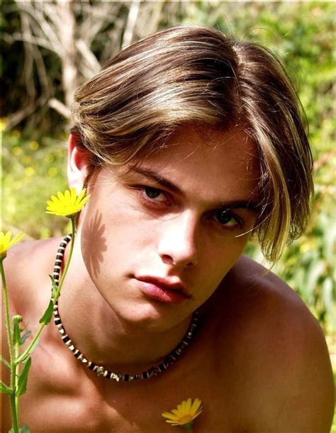 3. Blowout Leonardo DiCaprio Hairstyles. Although a traditional blowout typically includes a temple fade, we can let it slide. Also, because this is Leonardo DiCaprio we're talking about, consider this one-of-a-kind hairstyle of his a blowout as well. Source. 4. Middle Part Leonardo DiCaprio Hairstyles.. 
