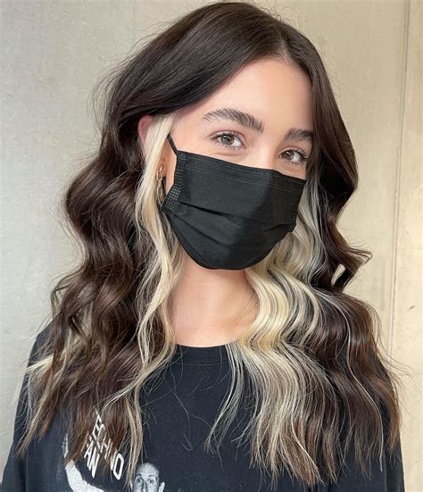 Blonde hair that has black underneath is the perfect way to replicate a natural look without having to use multiple colors in your hair. However, if you want a more dramatic look with big waves and depth, try using two different shades of blonde for the top and bottom layers of your hair. Blonde Underlayer Hair 2020. 