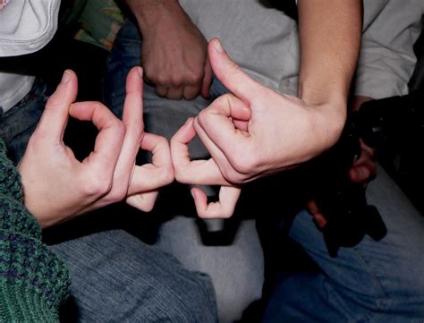 "Throwing up" a gang sign (e.g., "Stacking", "page", "gang walk" [clarification needed]) with the hands is one of the most known and obvious forms of "claiming" or stating the gang …. 