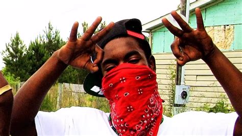 Blood gang symbol. Blood: A member of the Bloods, a rival gang to the Crips, known for their red clothing and affiliation with the color. Slangin': Selling drugs, typically on the street or in a specific territory controlled by a gang. Gangbanging: Engaging in criminal activities or violence on behalf of a gang. 