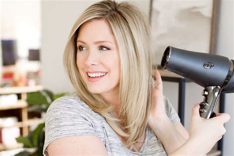 Blow dry hair. Step 3: Use a brush to blow dry hair. Working through the different sections one at a time, start blow drying your hair with your hairdryer and brush. Celebrity hairstylist Luke explains the importance of ‘making sure the airflow is down the hair shaft for a smoother, straighter finish.’. Taking your time, direct the hairdryer downwards ... 