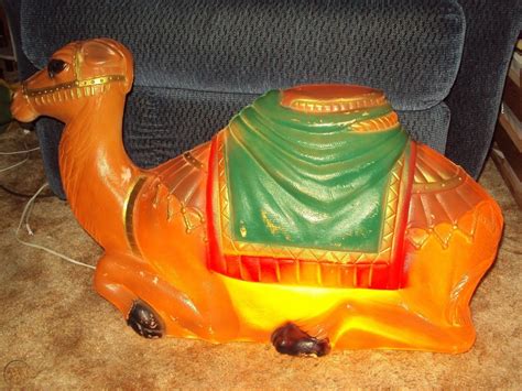 Blow Mold Nativity Camel made by Santa's Best with light. ASKING $90.00 OBO Vintage large Nativity Camel. Measures 33 inches long, 24 inches tall at the head and 18 inches deep. It has had some damage but has been repaired and works great. Always open to offers. Pickup only but willing to meet part way to deliver.. 