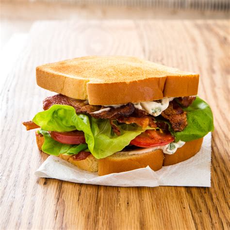 Contact information for renew-deutschland.de - Cook the bacon, turning occasionally, until crisp, about 5 minutes. Remove to paper towels and let drain. Toast your bread lightly. Spread one side of each slice with mayonnaise. Top with lettuce, tomato and bacon. Season with salt and pepper to taste. Top with second slice of toasted bread and cut in half.