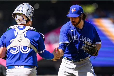 Blue Jays get homers from Guerrero and Belt before Romano holds off the Mariners, 4-3