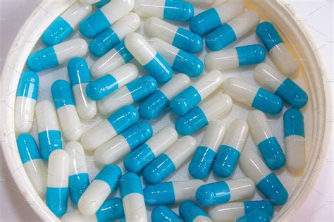 S489 40 mg Pill - green & white capsule/oblong, 16m