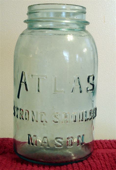 Antique Aqua Blue Glass Atlas Strong Shoulder Half Gallon Size Mason Jar With Glass Bubble Imperfections Boyds Hazel Atlas Lid Canning Jar Nice bubbles. Very nice condition, no issues. Half gallon size.. 
