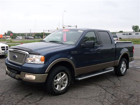 Blue book value 2004 ford f150. King Ranch Pickup 4D 5 1/2 ft. $33,115. $7,897. Harley-Davidson Pickup 4D 5 1/2 ft. $37,295. TBD. For reference, the 2003 Ford F150 SuperCrew Cab originally had a starting sticker price of $28,965 ... 