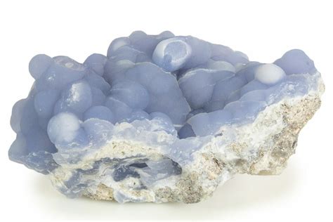 Blue botryoidal chalcedony.  Blue Chalcedony forms botryoidal crystals.  ...