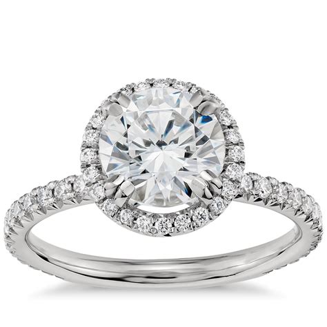 Blue nile engagement rings. Eternity-style engagement rings feature a band that showcases a continuous arrangement of accent diamonds around the band. It’s important to note that eternity rings must be purchased in the correct size, since they can’t be resized due to the accent diamonds on the band. 