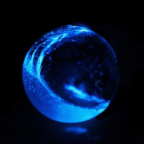 "Two weeks after she passed my phone accidentally took a picture of my dog, and there floating by his head was a little blue orb, the same color as this," said Lattanzi, touching a pendant she was .... 