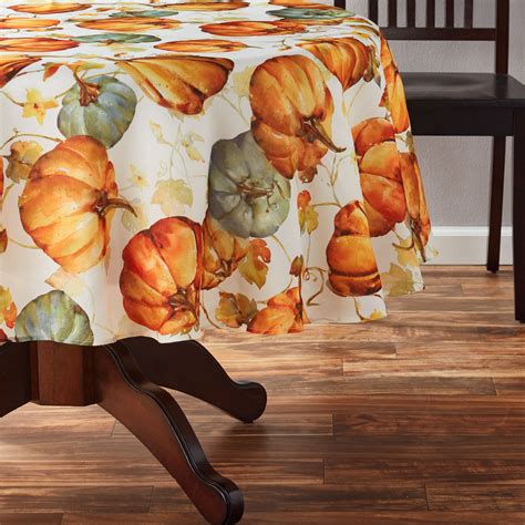 Love this tablecloth! The navy blue and white stripe is subtle. Its hard to find round tablecloths for a kitchen table. It works perfectly in our breakfast room. ... The autumn pumpkin grove printed tablecloth brings a festive note to your table setting throughout the fall season. Harvest-inspired, decorated with heirloom orange pumpkins .... 