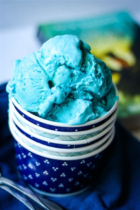Blue raspberry ice cream. Place 1 cup heavy cream in a medium bowl, set aside. In a medium saucepan over medium-low heat, heat milk with remaining 1 cup heavy cream, sugar, salt and jam. Stir to dissolve sugar. Cook over until steaming. In a small bowl, whisk egg yolks. Slowly drizzle 1 cup of the hot liquid into egg yolks while whisking constantly. 