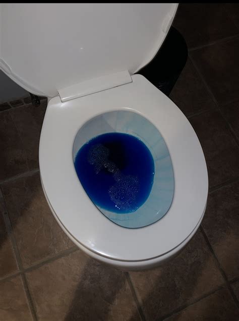 Blue toilet water. Let a cup of vinegar sit in the bowl for approximately 20 minutes. Using a toilet brush, scrub the bowl to remove any leftover discoloration. Flush the toilet to clean … 