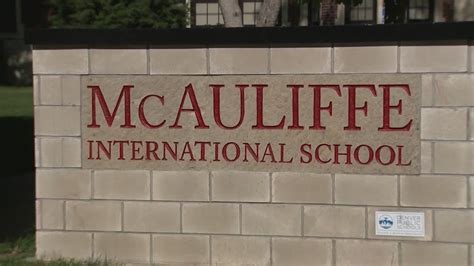 Board votes to fire embattled former McAuliffe principal