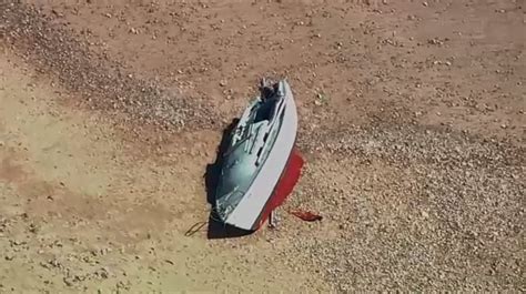Boat washes ashore in Duxbury, prompting search