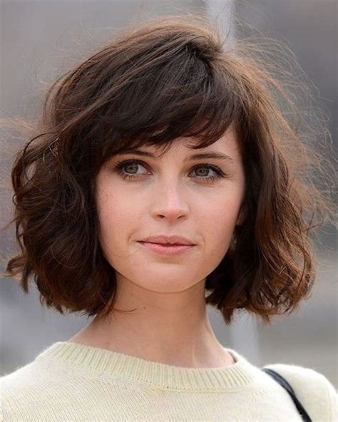 5. Asymmetrical Layered Bob. This asymmetrical bob hairstyle with bangs has choppily layered hair instead of just the bangs. You can have straight or wavy hair. Better still, go for slightly curled bangs to add a more artsy and casual look to your overall vibe. 6. Asymmetrical Bob with Side Swept Bangs.