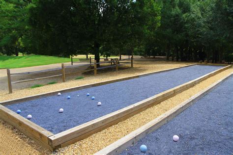 Bocce ball court. Standard bocce ball court dimensions are 27.5 meters (90 feet) in length and 4 meters (13 feet) in width. Marking the boundaries and key areas of … 