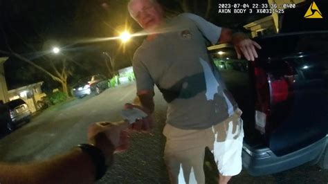 Body cam catches elite federal prosecutor offering Justice Department card during DUI crash arrest