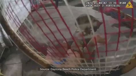 Bodycam shows officer beating suspect with tennis racket at dealership in Daytona Beach