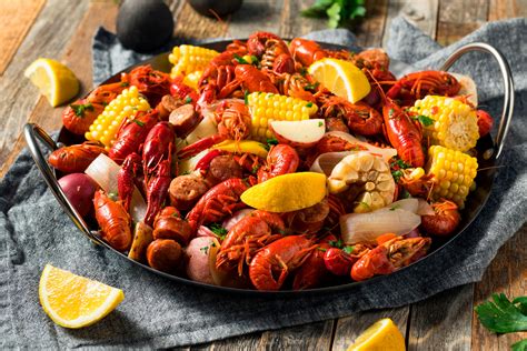 Boil seafood. May 31, 2022 · Bring a large pot of water to a boil. Add potatoes, sausages, onions, corn, and seafood seasoning. Boil until potatoes are cooked through, about 30 minutes. Gently drop crabs into pot and boil until crabmeat is cooked through, at least 10 minutes. Drain and serve. 