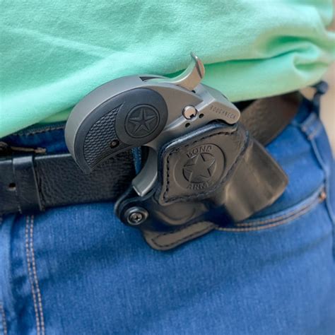 This is a thumb break leather holster for your Bond Arms Derringer. Bond’s very comfortable “Thumb Break” belt slide features twin belt slots for an extremely close and comfortable ride. This holster accepts belts up to 1 1/2″ in width. These holsters are meant to be used with the Satin (smooth polished stainless steel) finished firearms.. 