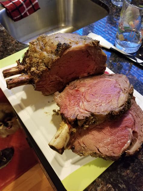 Bone-in ribeye roast. Step 2. 2. Roast the meat for 2 hours and 20 minutes (or about 14 minutes per pound at 130°F on a meat thermometer) for rare meat. For medium-rare meat, roast until a meat thermometer reads 140 ... 