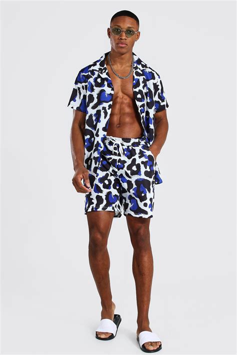 Boohooman com. Style Plain Swim Shorts. $17.00 (50% OFF) $34.00. Mid Length Man Swim Short. Length Mid. Occasion Casual. Style Printed Swim Shorts. $10.00 (50% OFF) $20.00. Short Sleeve Pastel Bandana Shirt And Swim Trunks. Occasion Beachwear. 