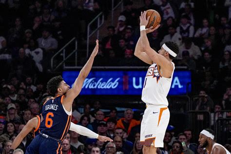 Booker hits 3-pointer with 1.7 seconds left, Suns beat Knicks 116-113 for 7th straight win