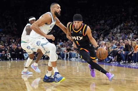 Booker scores 31 in return from injury, Suns roll past Timberwolves 133-115