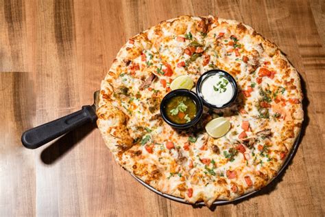 Boombozz pizza & taphouse. Boombozz Pizza’s history dates back to 1998 when Tony Palombino decided to combine his personal recipes and family secrets to create gourmet pizzas. Boombozz has been featured by FoodNetwork, BusinessWeek, Pizza Today and more! 