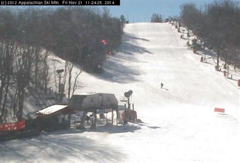 This webcam is located directly adjacent to the popular sledding hill atop Beech Mountain, NC and looks out at the Beech Mountain Resort ski slopes as well.. 