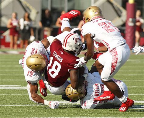Boston College holds off late Holy Cross rally in a 31-28 win