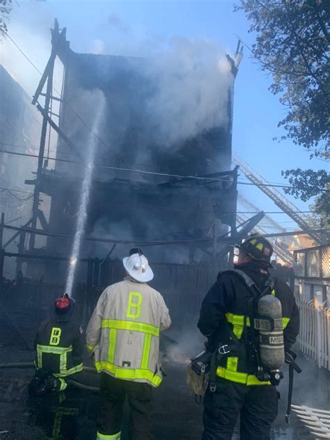 Boston firefighters battle 4-alarm blaze in Dorchester, rear porches collapse