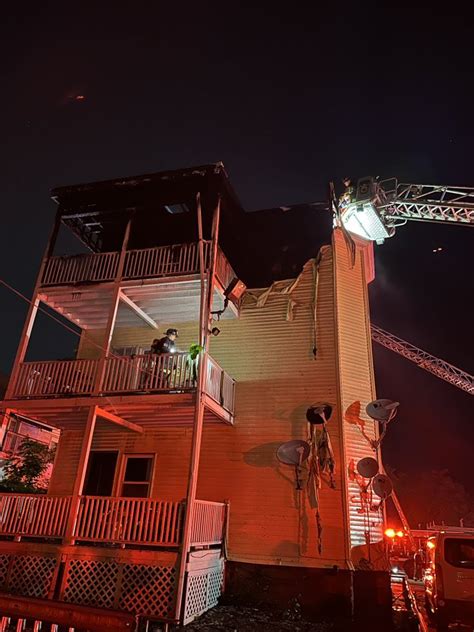 Boston firefighters rescue 2 residents from heavy blaze, 12 residents displaced