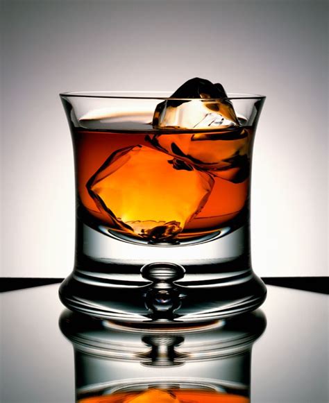 Bourbon on the rocks. From there, whisky can be enjoyed "neat," which is without any mixer or ice. Neat whisky is usually a two-ounce serving at room temperature in a lowball glass. Many aficionados will add a few ... 