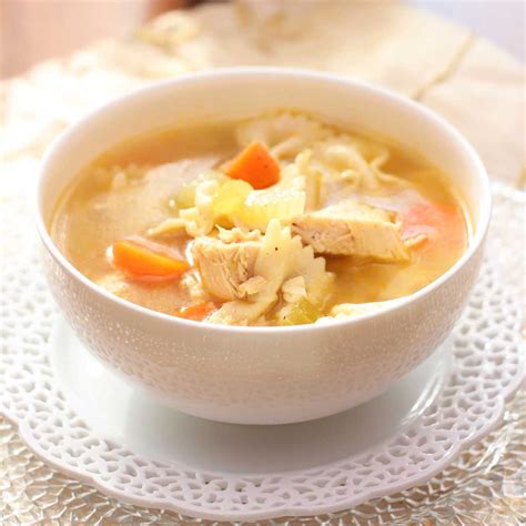 Bowl of soup. Ina Garten’s cauliflower soup recipe involves cooking cauliflower, celery root, fennel and onions in chicken stock before blending the mixture and adding cream. Serve the soup in i... 