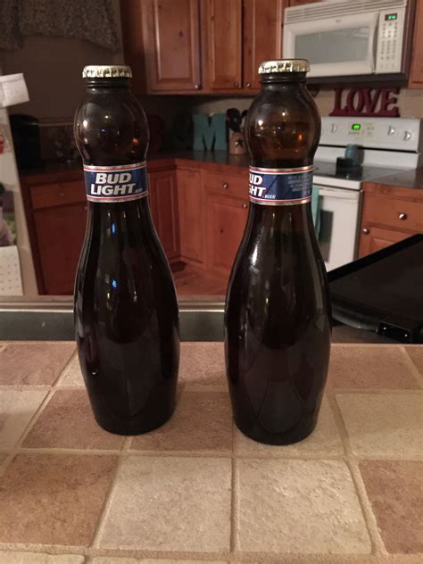 Bowling pin beer bottles. Budweiser bowling pin bottles in very good condition. They are 9 1/2" tall. 