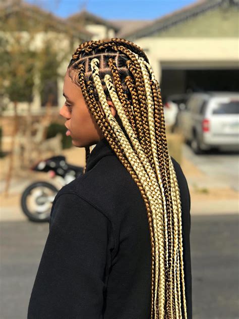 SEE ALSO: 50 Trending Medium Box Braid Hairstyles. 30. Brown Knotless Stitch Cornrow Box Braids with High Bun. Source. ... Bring a swing to lemonade box braids with reverse cornrows at the side for a Fulani braid flair. You can also mix your colors—brown and black make a great team. 55. Medium Black and Red Knotless Box …. 
