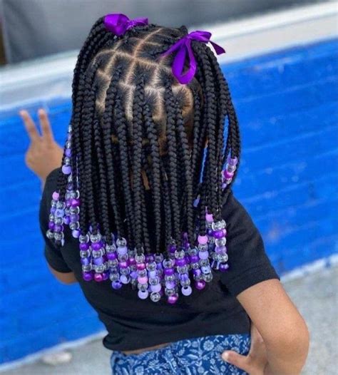 7. Ghana Cornrows for Girls. For black girls, Ghana cornrows are a stunning option that are making a comeback. Although thick cornrows usually have straight sections, this style adds little braids and curves in between. Children can have even more fun with this style by adding a few colorful beads.. 