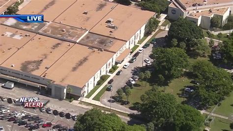 Boyd Anderson High School on lockdown after report of person armed on campus, 1 detained; no injuries reported