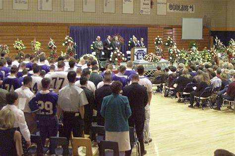 Arkansas coach Houston Nutt speaks during the funeral for 