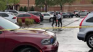 A law enforcement officer exits the Starts Right Here building, Monday, Jan. 23, 2023, in Des Moines, Iowa. Police say two students were killed and a teacher was injured in a shooting at the Des .... 