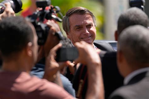 Brazil police search Bolsonaro’s home, seize his phone