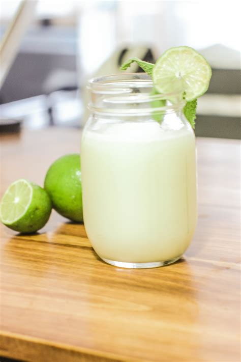 Brazilian lemonade cocktail. Jul 5, 2023 · Wash limes thoroughly. Cut ends off and discard, then slice into about 8 pieces. Place limes, water, sugar, and sweetened condensed milk in a blender. Pulse 5 times. Strain mixture through a sieve into a large pitcher. Serve over ice. 