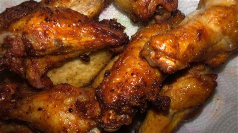 Breaded vs non breaded wings. Dip wings in egg, then place in bag and shake to coat. Place in a greased 15x10x1-in. baking pan. Bake at 425° for 30-35 minutes or until juices run clear, turning once. 