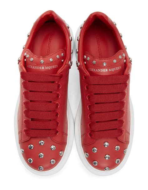 Break the Fashion Barriers with Captivating Alexander McQueen Sneakers Red