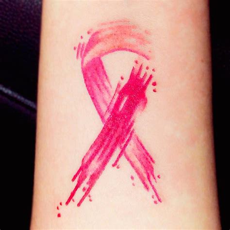 Breast cancer ribbon tattoo ideas. Pearl ribbon tattoo. This ribbon will be used to symbolize lung cancer and it will be applied to any area of the body. Purple ribbon. This is also a common type of ribbon that is applied as a tattoo. It symbolizes a number of cancers, including the testicular cancer, pancreatic cancer, and thyroid cancer. 