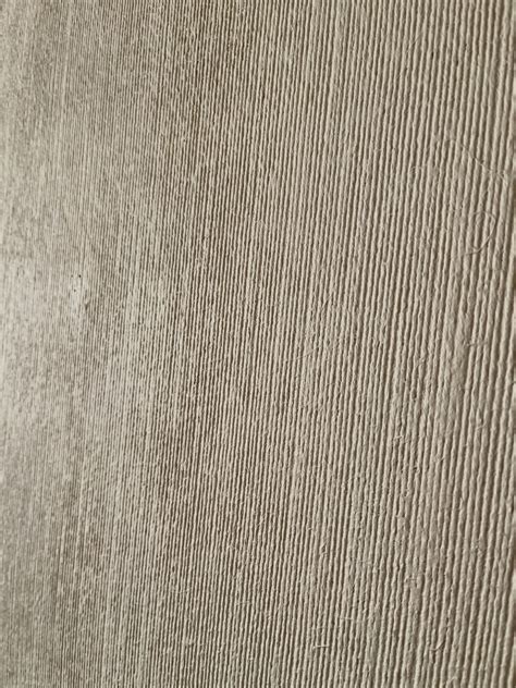 Bredspackla vävtapet